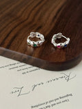 Heart-shaped earrings made of colored zircon