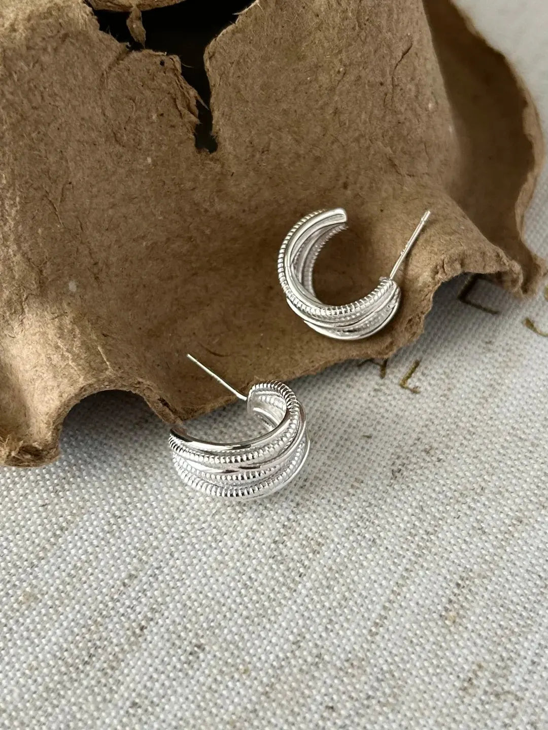 Unique silver multi-layered braided linear earrings