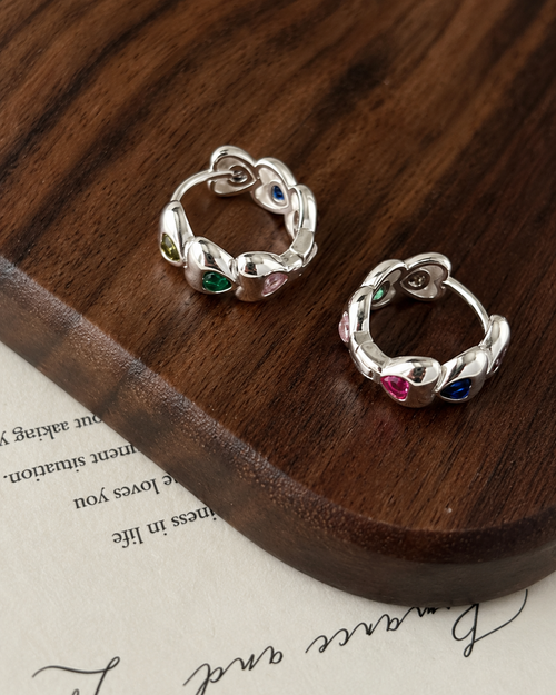 Heart-shaped earrings made of colored zircon